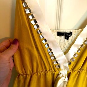 Pixie Gold and White dress with silver embellishments